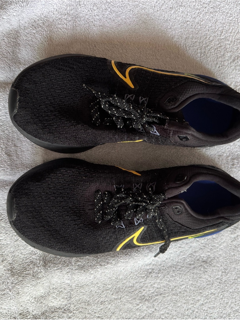 Nike Men’s Black Athletic Shoes with Yellow Swoosh